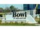 The community sign, 'The Bowl at Ballantyne' framed by landscaping and greenery at 15310 Ballancroft Pkwy # 20, Charlotte, NC 28277