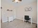 Spacious bedroom with a desk and plenty of natural light at 1544 Farmington Hills Dr, Conover, NC 28613