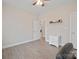 Light and airy bedroom with wood-look flooring and neutral decor at 1544 Farmington Hills Dr, Conover, NC 28613