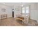 Charming dining room with farmhouse table and bench seating at 1544 Farmington Hills Dr, Conover, NC 28613