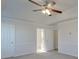 Primary bedroom with ceiling fan and neutral wall colors at 156 Elrosa Rd, Mooresville, NC 28115