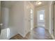 Spacious hallway with light flooring and access to bedrooms and bath at 156 Elrosa Rd, Mooresville, NC 28115