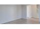 Living room with hardwood floors and neutral walls, showing access to the stairs at 156 Elrosa Rd, Mooresville, NC 28115