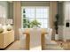 Dining room with light wood table, white chairs, and large window with green curtains at 1572 Croyden St, Indian Land, SC 29707