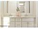 Double vanity bathroom with modern fixtures and a large mirror at 1602 Croyden St, Indian Land, SC 29707