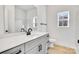 Modern bathroom with gray vanity and black fixtures at 1715 Pope Ave, Gastonia, NC 28052