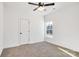 Well-lit bedroom featuring a ceiling fan and window at 1715 Pope Ave, Gastonia, NC 28052