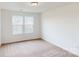 Bright bedroom with carpet flooring and large windows at 2125 Clifton Rd, Sherrills Ford, NC 28673