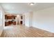 Open concept kitchen with dark wood cabinets, granite counters, and a large island at 2125 Clifton Rd, Sherrills Ford, NC 28673