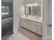 Double vanity bathroom with two sinks and mirrors at 2154 Pheasant Glen Rd, Charlotte, NC 28214