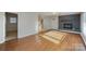 Living room with hardwood floors and fireplace at 2214 Munsen Rd, Concord, NC 28025