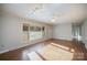 Spacious living area with hardwood floors and fireplace at 2214 Munsen Rd, Concord, NC 28025