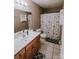 Clean bathroom with shower/tub combo, vanity, and tiled floor at 2240 15Th Ne Ave # 105, Hickory, NC 28601