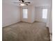 Spacious bedroom with neutral walls, carpet, and large windows at 2240 15Th Ne Ave # 105, Hickory, NC 28601