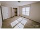 Bright bedroom with carpet, closet, and a window at 2240 15Th Ne Ave # 105, Hickory, NC 28601