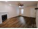 Living room with fireplace and wood-look floors at 2240 15Th Ne Ave # 105, Hickory, NC 28601