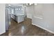 Open concept dining area with hardwood floors and a view of the kitchen at 22433 Gateway Dr, Lancaster, SC 29720