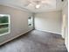 Spacious main bedroom with neutral carpeting and large windows at 22433 Gateway Dr, Lancaster, SC 29720