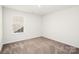 Bright bedroom featuring a window with blinds and neutral wall colors at 2262 Redstone Dr, York, SC 29745