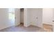 Spacious bedroom with neutral carpeting and ample closet space at 242 Winford Rd, Troutman, NC 28116