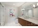 Spa-like bathroom with marble vanity and large mirror at 315 Arlington Ave # 2201, Charlotte, NC 28203