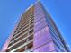 Modern high rise building with purple glass facade at 315 Arlington Ave # 2201, Charlotte, NC 28203