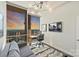 Modern home office boasts city skyline views at sunset at 315 Arlington Ave # 2201, Charlotte, NC 28203