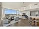 Open living room boasting hardwood floors and city views at 315 Arlington Ave # 2201, Charlotte, NC 28203