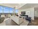 Light-filled living room with city views and comfortable seating at 315 Arlington Ave # 2201, Charlotte, NC 28203