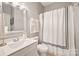 Clean bathroom with white vanity and shower at 3332 Delaware Dr, Denver, NC 28037