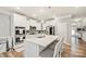 Modern kitchen featuring white cabinets and a large island at 3332 Delaware Dr, Denver, NC 28037