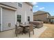 Private patio with hot tub and seating for four at 3332 Delaware Dr, Denver, NC 28037