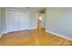 Bright bedroom with hardwood floors and spacious closet at 3821 Silver Bell Dr, Charlotte, NC 28211