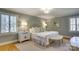 Bright bedroom with plantation shutters and neutral decor at 3821 Silver Bell Dr, Charlotte, NC 28211