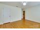 Spacious bedroom with hardwood floors and ample closet space at 3821 Silver Bell Dr, Charlotte, NC 28211