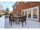 Deck with wooden table and chairs near sliding glass doors at 3821 Silver Bell Dr, Charlotte, NC 28211