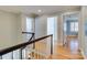 Upstairs hallway with access to bedrooms and stairs at 3821 Silver Bell Dr, Charlotte, NC 28211