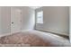 Spacious bedroom with neutral walls and carpeted floors at 4005 Grace Pointe Dr # 100, Wesley Chapel, NC 28079