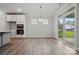 Dining area featuring hardwood floors, pendant lighting, and a sliding glass door to the backyard at 4005 Grace Pointe Dr # 100, Wesley Chapel, NC 28079