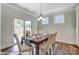 Elegant dining room with hardwood floors and access to backyard at 4005 Grace Pointe Dr # 100, Wesley Chapel, NC 28079