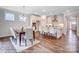 Kitchen and dining area with hardwood floors at 4005 Grace Pointe Dr # 100, Wesley Chapel, NC 28079