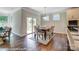 Bright dining room with sliding glass doors leading to the backyard at 4005 Grace Pointe Dr # 100, Wesley Chapel, NC 28079