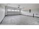 Attached garage with ample space for parking and storage at 4005 Grace Pointe Dr # 100, Wesley Chapel, NC 28079