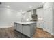 Spacious kitchen featuring a large island, stainless steel appliances, and plenty of cabinet space at 4005 Grace Pointe Dr # 100, Wesley Chapel, NC 28079