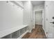 Functional mudroom featuring built-in storage and access to the main house at 4005 Grace Pointe Dr # 100, Wesley Chapel, NC 28079