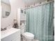 Simple bathroom with shower/tub combo and updated vanity at 409 Chinaberry Dr, China Grove, NC 28023