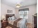 Bright bedroom with double bed, nightstand, and dresser at 409 Chinaberry Dr, China Grove, NC 28023