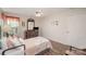 Well-lit bedroom with ceiling fan and ample closet space at 409 Chinaberry Dr, China Grove, NC 28023