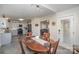 Open concept dining area with views into the living room at 409 Chinaberry Dr, China Grove, NC 28023