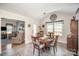 Dining area with hardwood floors and access to the kitchen at 409 Chinaberry Dr, China Grove, NC 28023